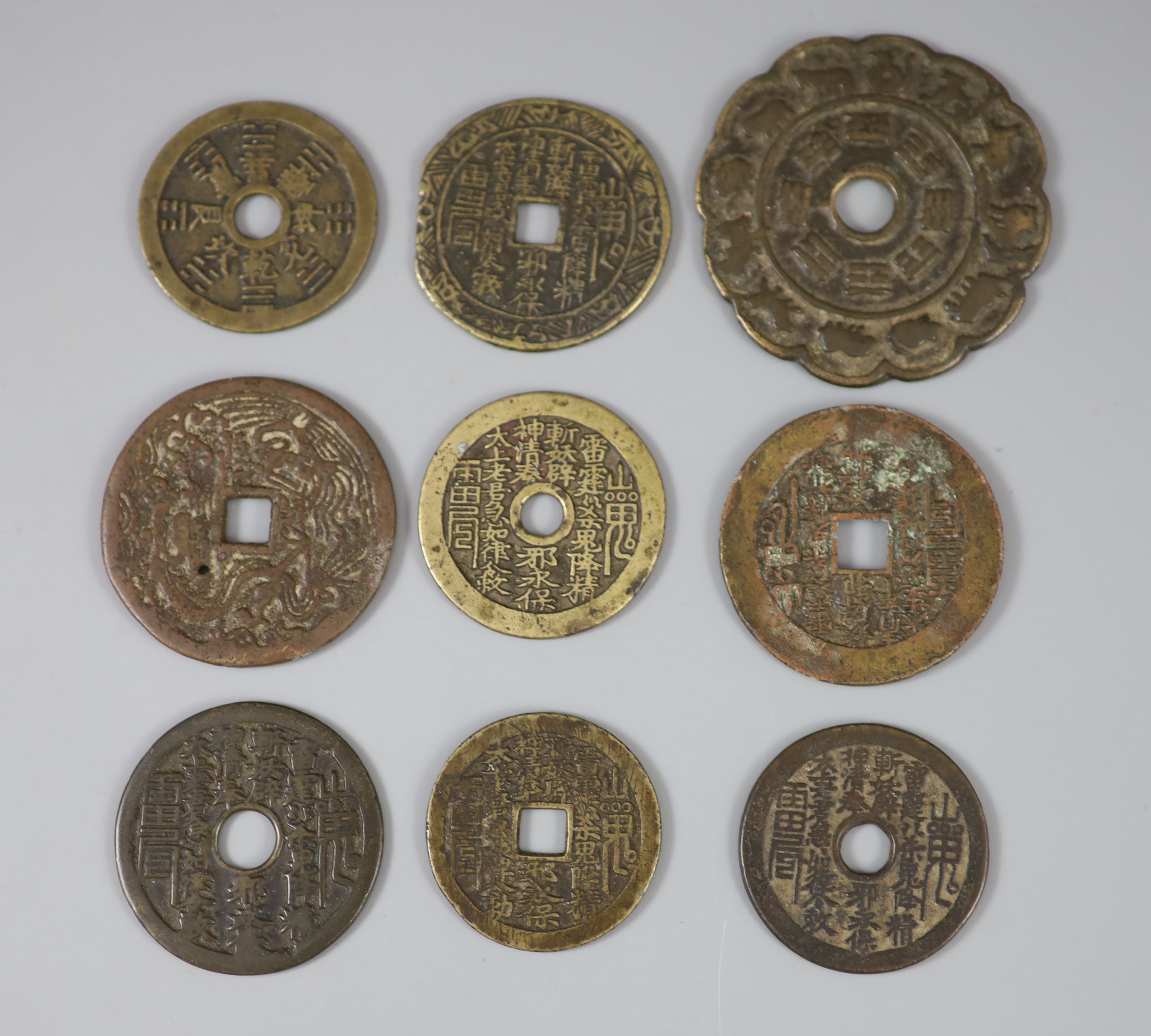 China, 9 bronze charms or amulets, Qing dynasty,